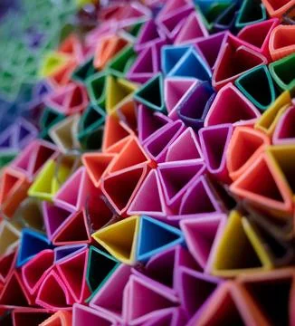 Background of colorful abstract texture with plastic triangles 스톡 사진