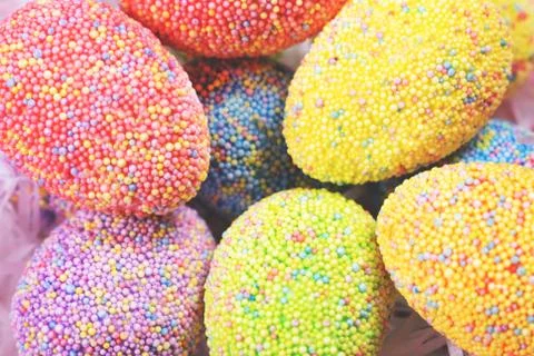 Background of colorful easter eggs. Stock Photos