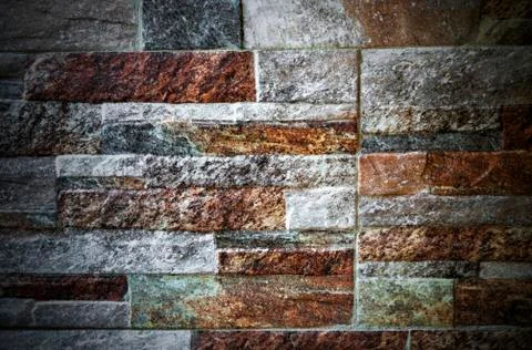 A background of colorful stone wall Stock Photos