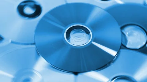 Background of compact discs in blue light Stock Footage 7751358