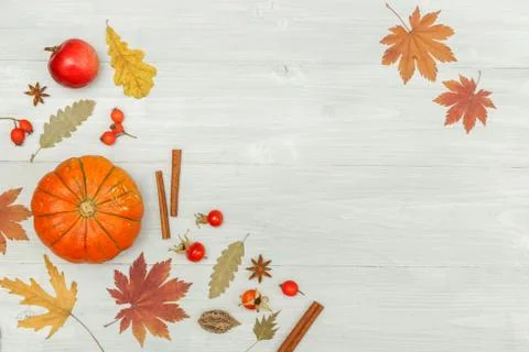 Background with a composition of dry autumn bright leaves and pumpkins. flatlay Stock Photos