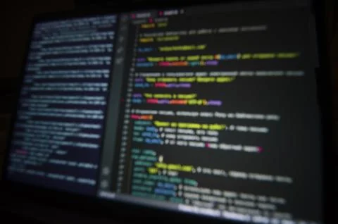 Background: computer code on laptop screen in blur Stock Photos