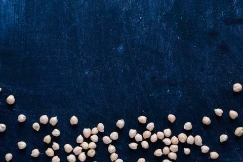 Background concept with chickpeas on blue Stock Photos