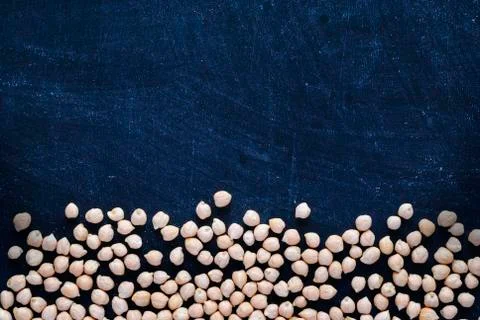 Background concept with chickpeas on blue Foto stock