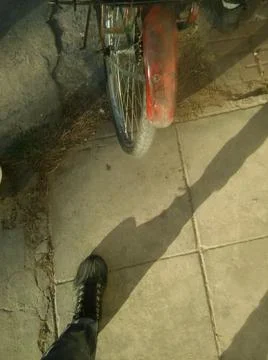 Background with concrete in a sidewalk with different elements in daylight Stock Photos
