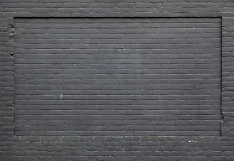 Background consisting of part of anthracite brick wall Stock Photos