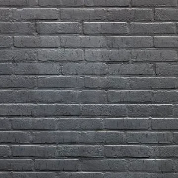 Background consisting of part of anthracite brick wall Stock Photos