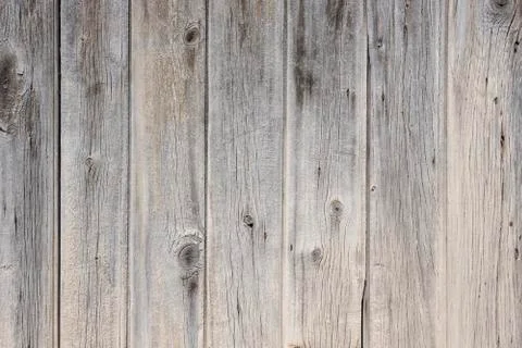 Background consisting of weathered old grey vertical planks Stock Photos