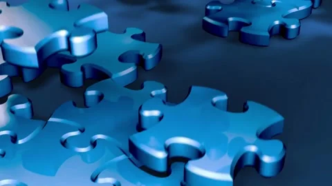 The background consists of puzzle elements. A lot of gold puzzle elements on a Video stock 336248275