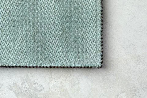 The background consists of several types of old colored tiles with different Stock Photos