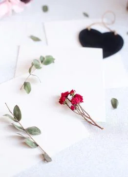 Background with copy space blank on table with black heart, eucalyptus branch Stock Photos