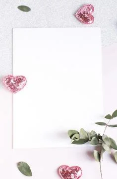 Background with copy space blank on white table with glitter heart, eucalyptu Stock Photos