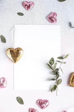 Background with copy space blank on white table with glitter heart, eucalyptu Stock Photos