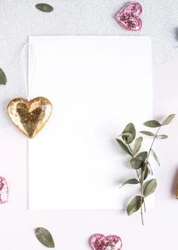 Background with copy space blank on white table with glitter heart, eucalyptu Stock Photos
