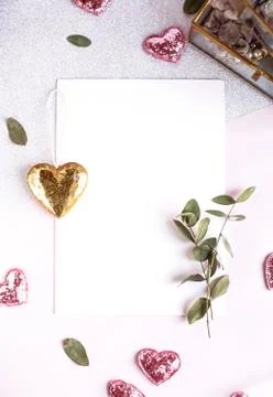 Background with copy space blank on white table with glitter heart, eucalyptu Stock Photos