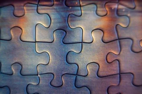 Background of correctly placed colored puzzle pieces Stock Photos