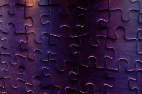 Background of correctly placed colored puzzle pieces Stock Photos