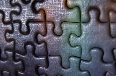 Background of correctly placed colored puzzle pieces Stock Photos