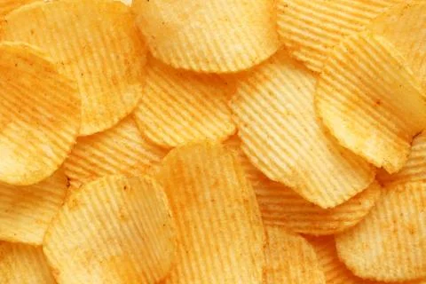Background corrugated golden chips with texture Stockfoto's