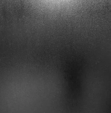 Background created on the basis of a semi-transparent glass with a figured su Stock Photos