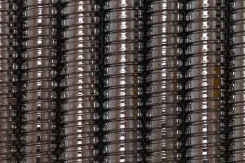 Background created by glossy chrome plated shower hoses Stock Photos