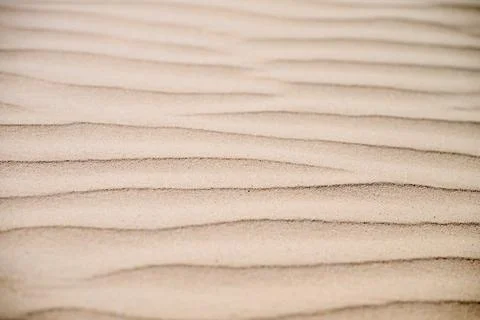 Background created using a close-up of a rippled sand dune on the coast of .. Stock Photos