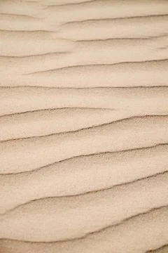 Background created using a close-up of a rippled sand dune on the coast of .. Stock Photos