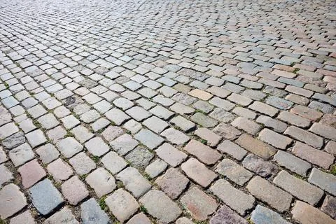 Background created using a close-up of a surface paved with rectangular stone Stock Photos