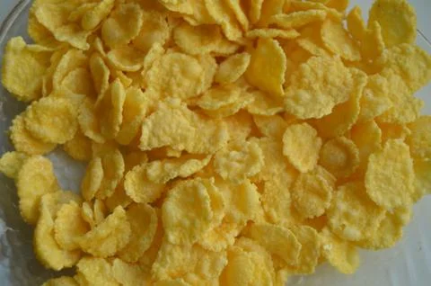 Background - crisp corn flakes, close-up, healthy eating Stock Photos
