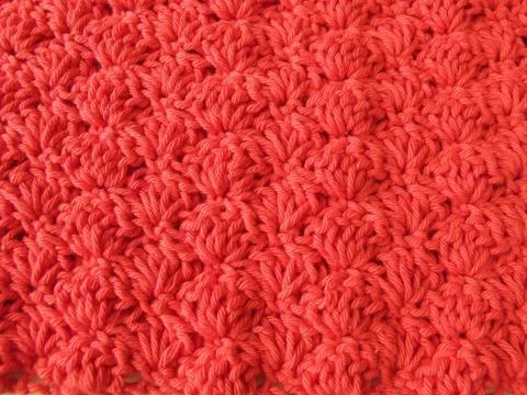 Background of crocheted shells in red Stock Photos