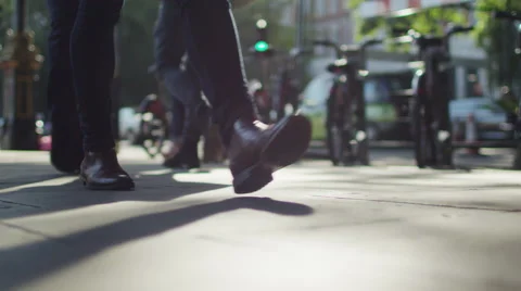 Background crowds walk past camera in slow motion Stock Footage 51828557