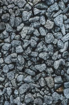 Background crushed stone closeup. Texture of granite gravel from rubble. Small Stock Photos