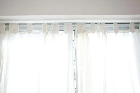 Background of the curtains in the sunlight Stock Photos