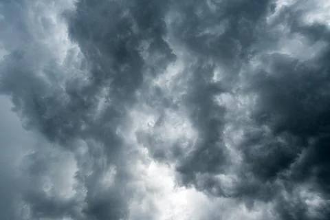 Background of dark clouds before a thunder-storm 写真素材