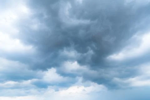 Background of dark clouds before a thunder-storm Stock Photos