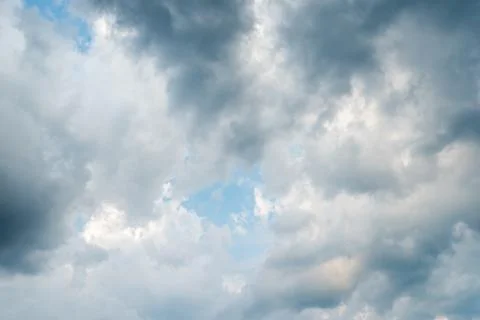 Background of dark clouds before a thunder-storm Stock Photos