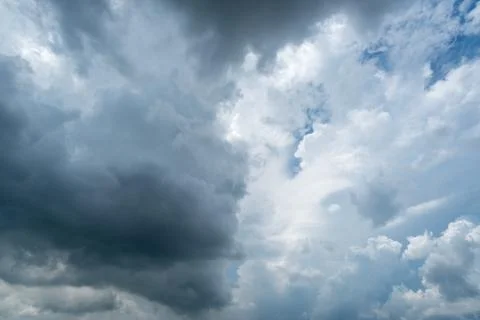 Background of dark clouds before a thunder-storm Stock Photos