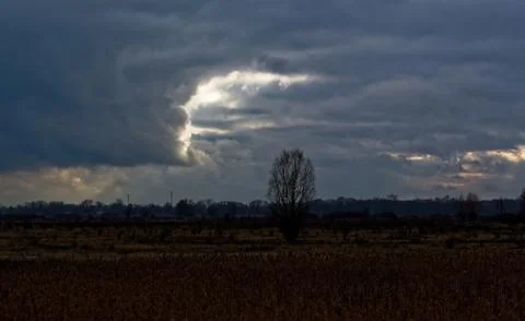Background of dark clouds before a thunder-storm Stock Photos