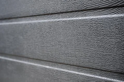 Background of dark gray siding side view Stock Photos