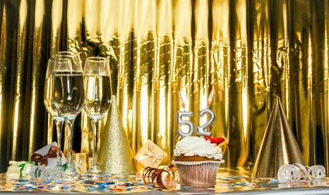 Background date of birth with number 52. Scenery festive glasses of champag.. Stock Photos