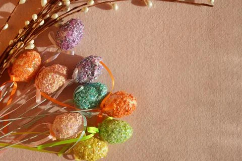 Background with decor for celebrating Happy Easter. colorful decorative eggs. Stock Photos