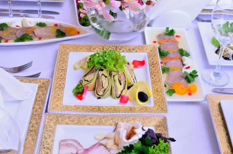 Background decorated table with dishes Stock Photos