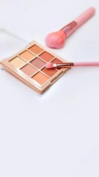 Background with decorative cosmetics on dressing table in makeup room Stock Photos