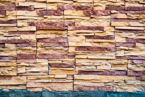 Background of decorative facing tiles. Texture of street decorative external 스톡 사진