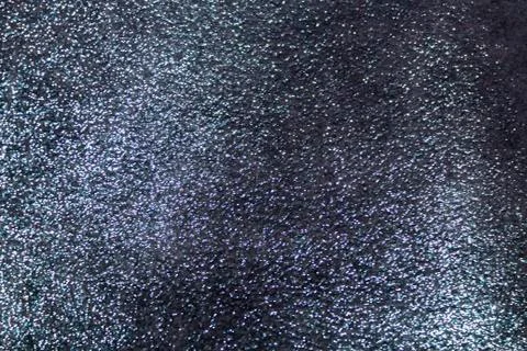 The background is a deep brilliant purple with grey cloth Stock Photos