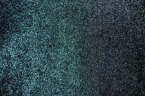 The background is a deep shiny green with gray cloth Stock Photos