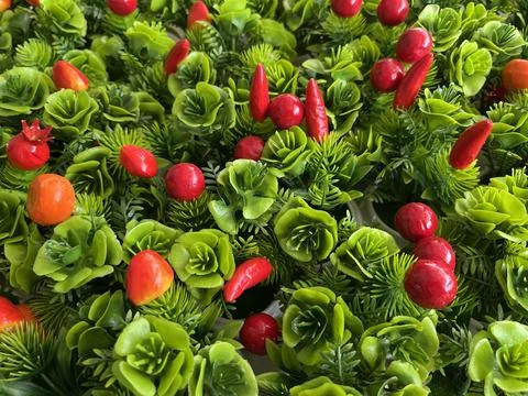 Background of dense green artificial succulent-like leaves Stockfoto's