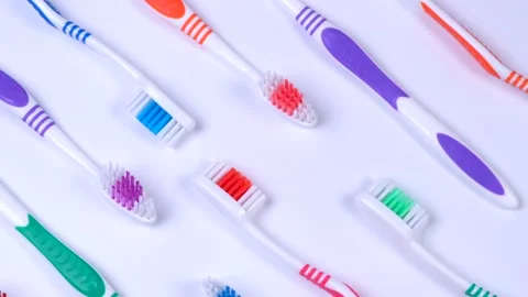 Background dental toothbrushes of different colors Stock Footage 223933145