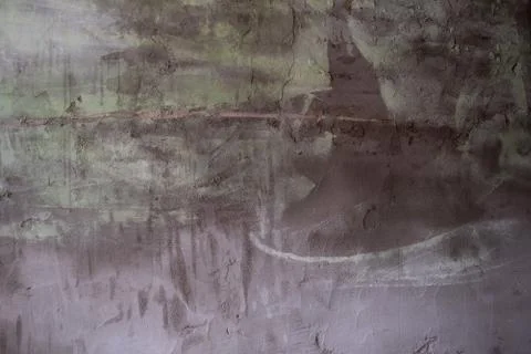Background for the designer colored wall color gray green brown in daylight. Stock Photos