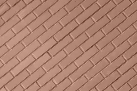 Background with diagonally placed bricks. Demonstrating color of 2025 year mocha Stock Photos